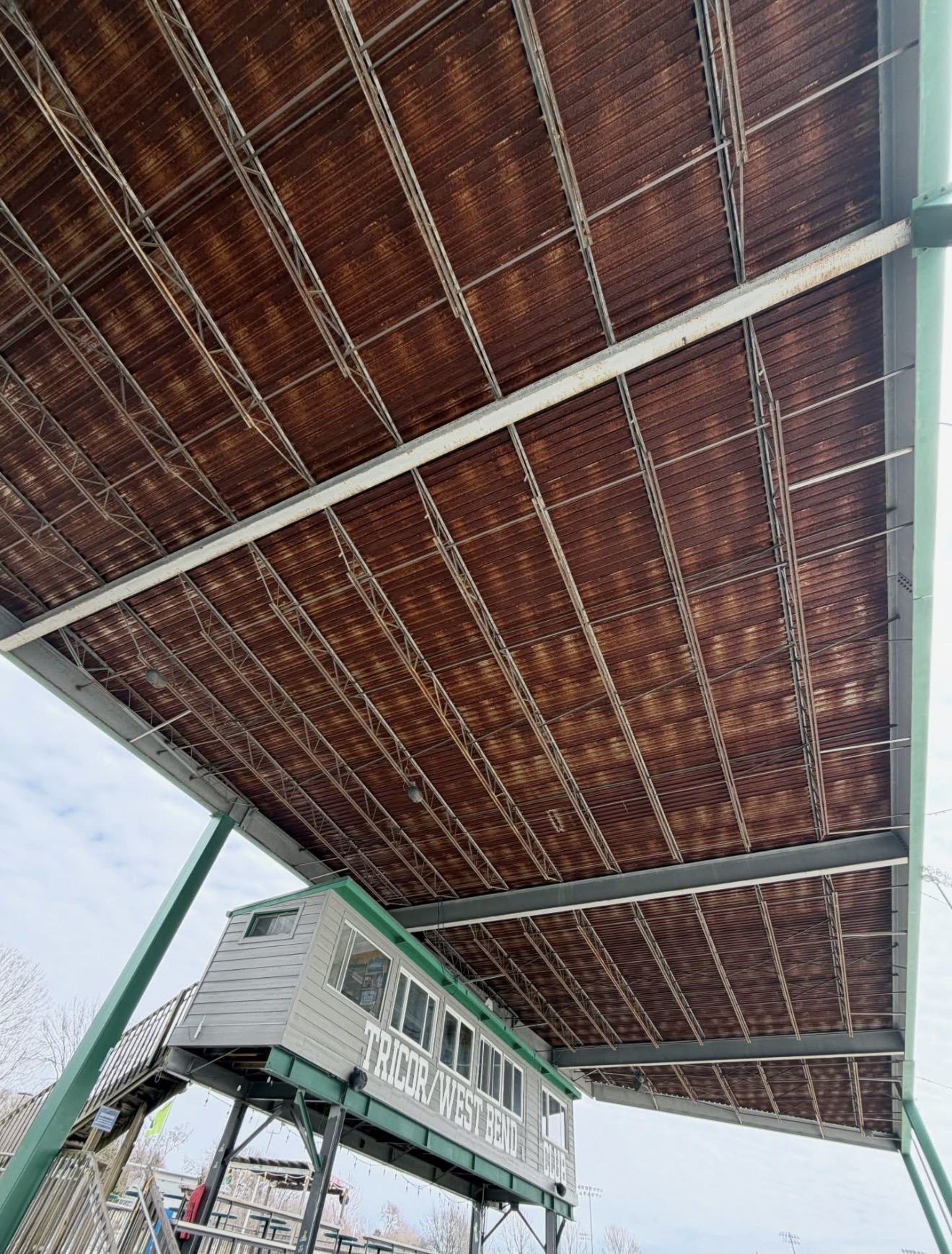 Stadium grandstand roof before repaint