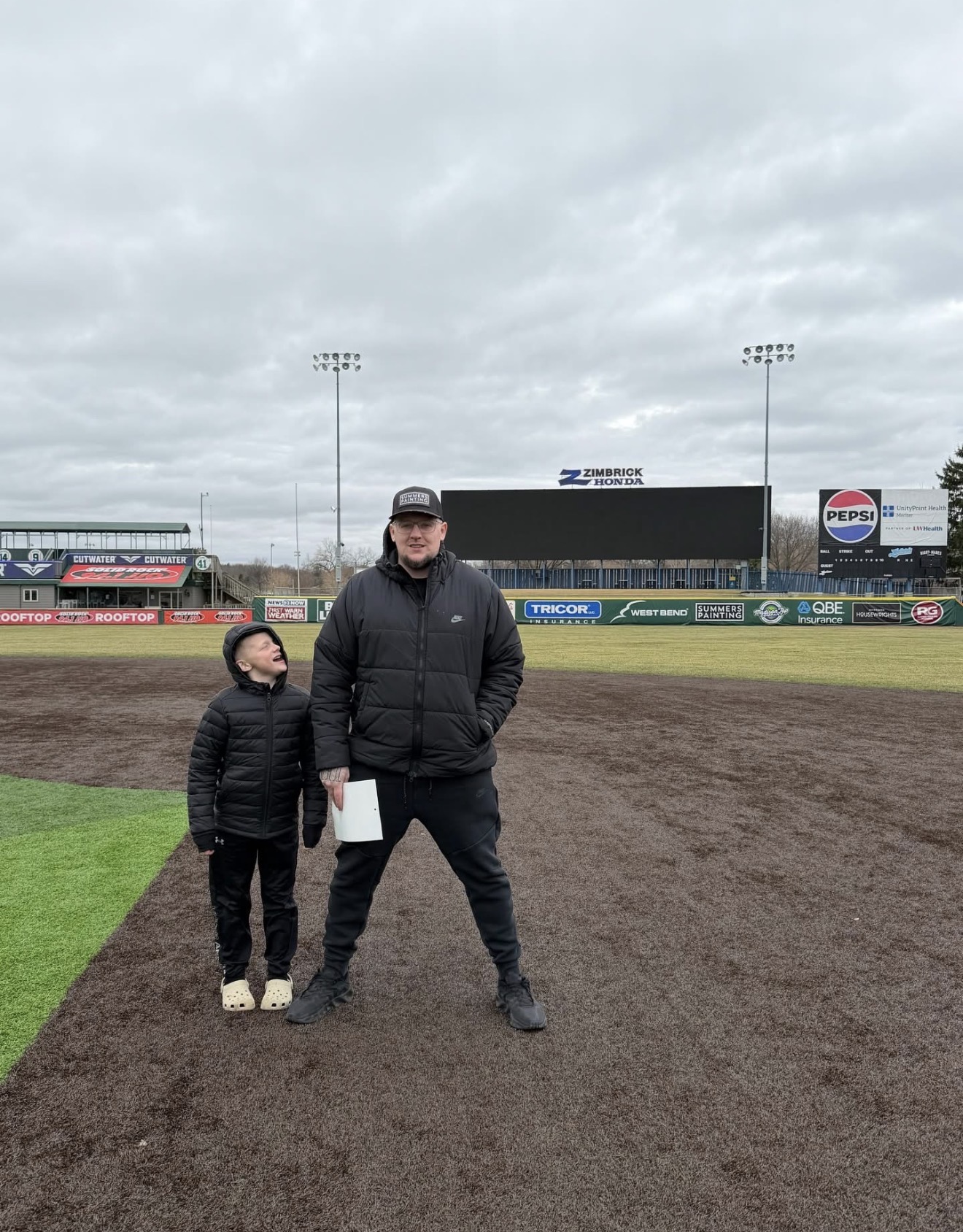 Scott Summers and son at the sponsored stadium