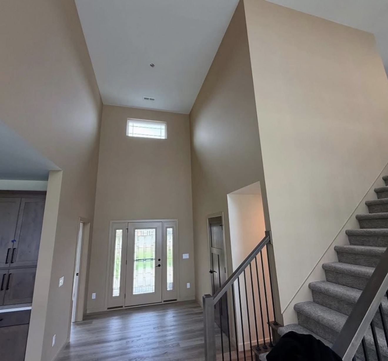 High ceiling entryway interior painting